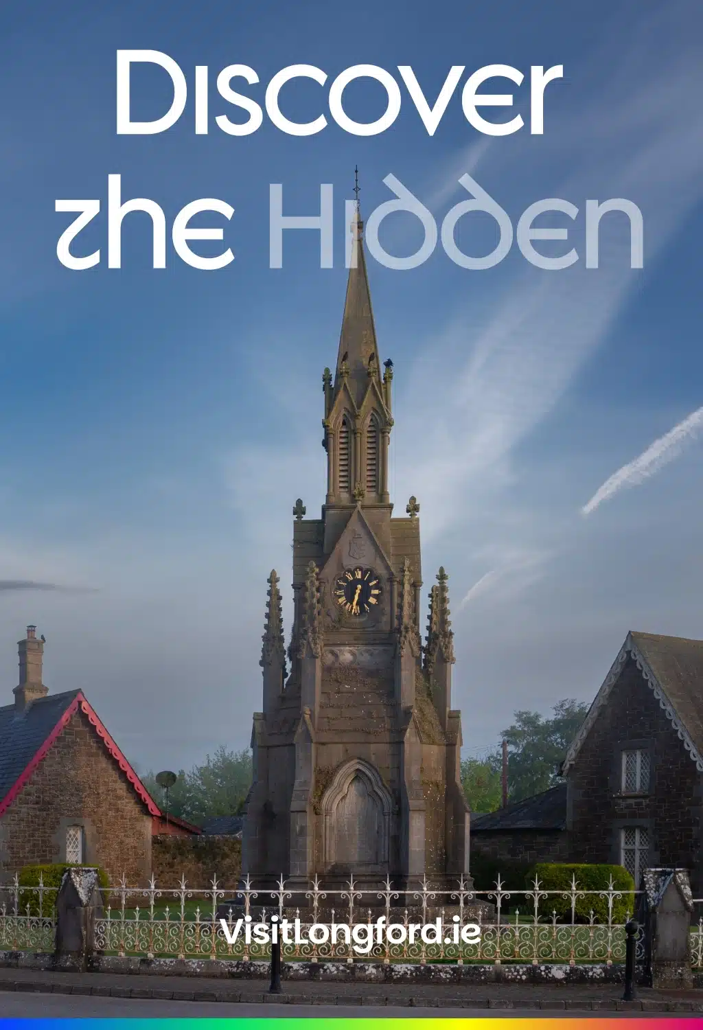 A tall stone clock tower stands between two cottages under a blue sky, with the text "Discover the Hidden" and "visitlongford.ie" overlaid on the image.