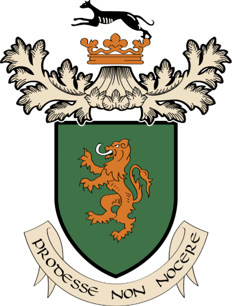 A green shield with a golden lion standing on hind legs, topped by an ornate crown and a black dog above it. Below the shield is a banner with the Latin motto "PRODESSE NON NOCERE.