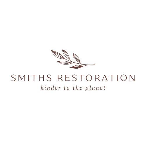 Logo for Smiths Restoration featuring a simple brown branch with leaves above the company name in uppercase letters. Below, the strapline reads "kinder to the planet" in lowercase italics. White background.
